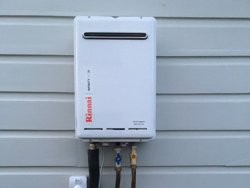 Wellington plumbers install Rinnai Infinity gas hot water system
